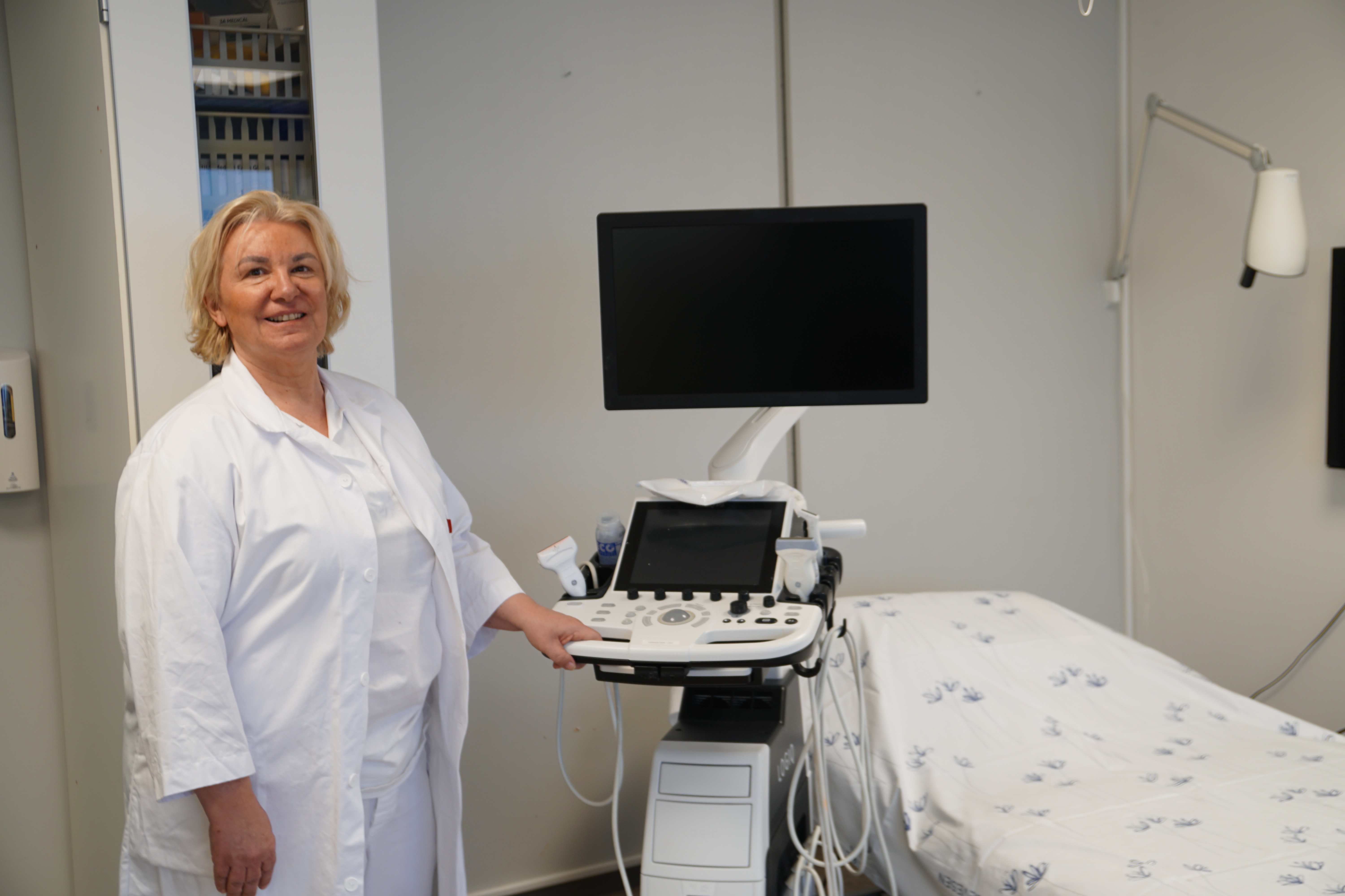 Femal doctor in a treatment room