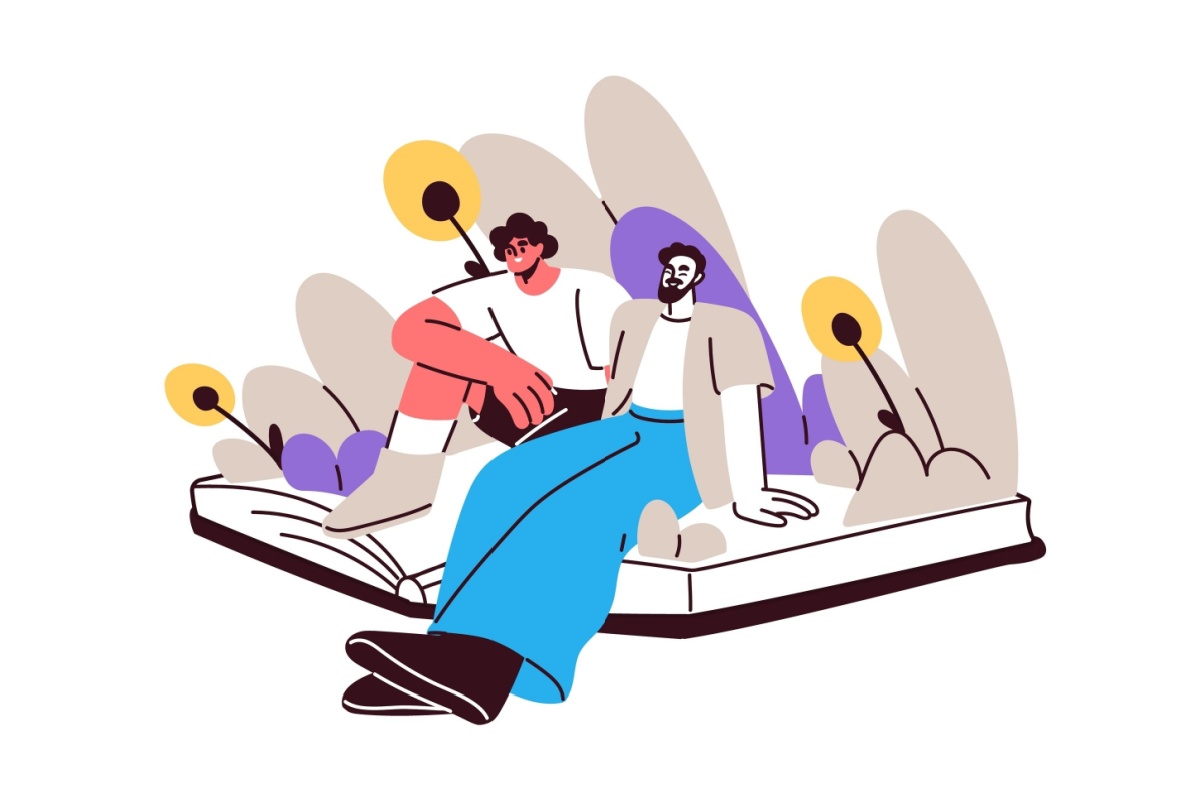 To menn som sitter og snaker på en bok