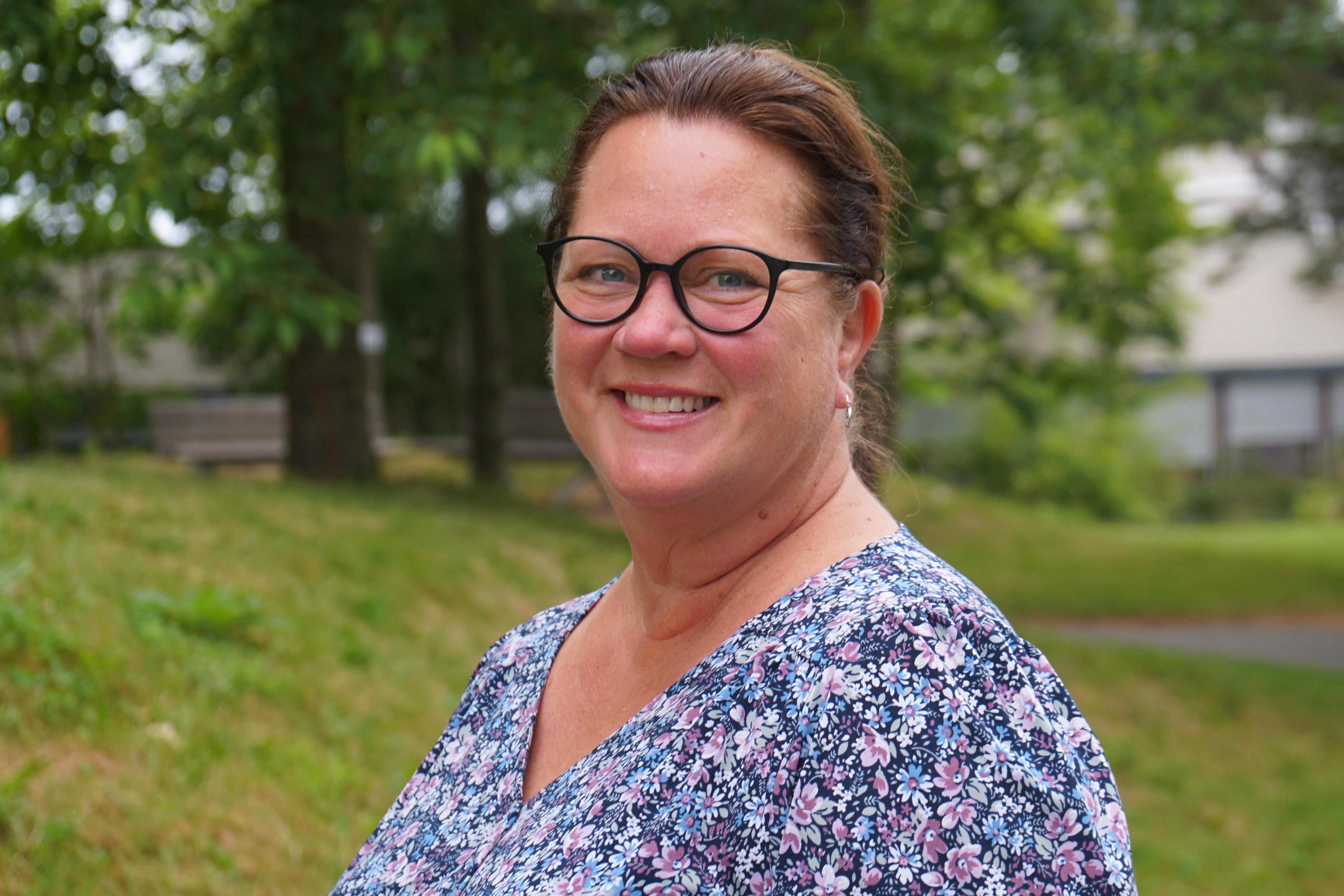 A woman wearing glasses