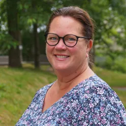 A woman wearing glasses