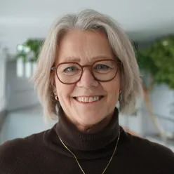 A woman wearing glasses
