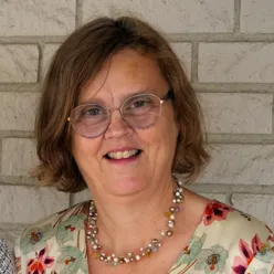 A woman wearing glasses
