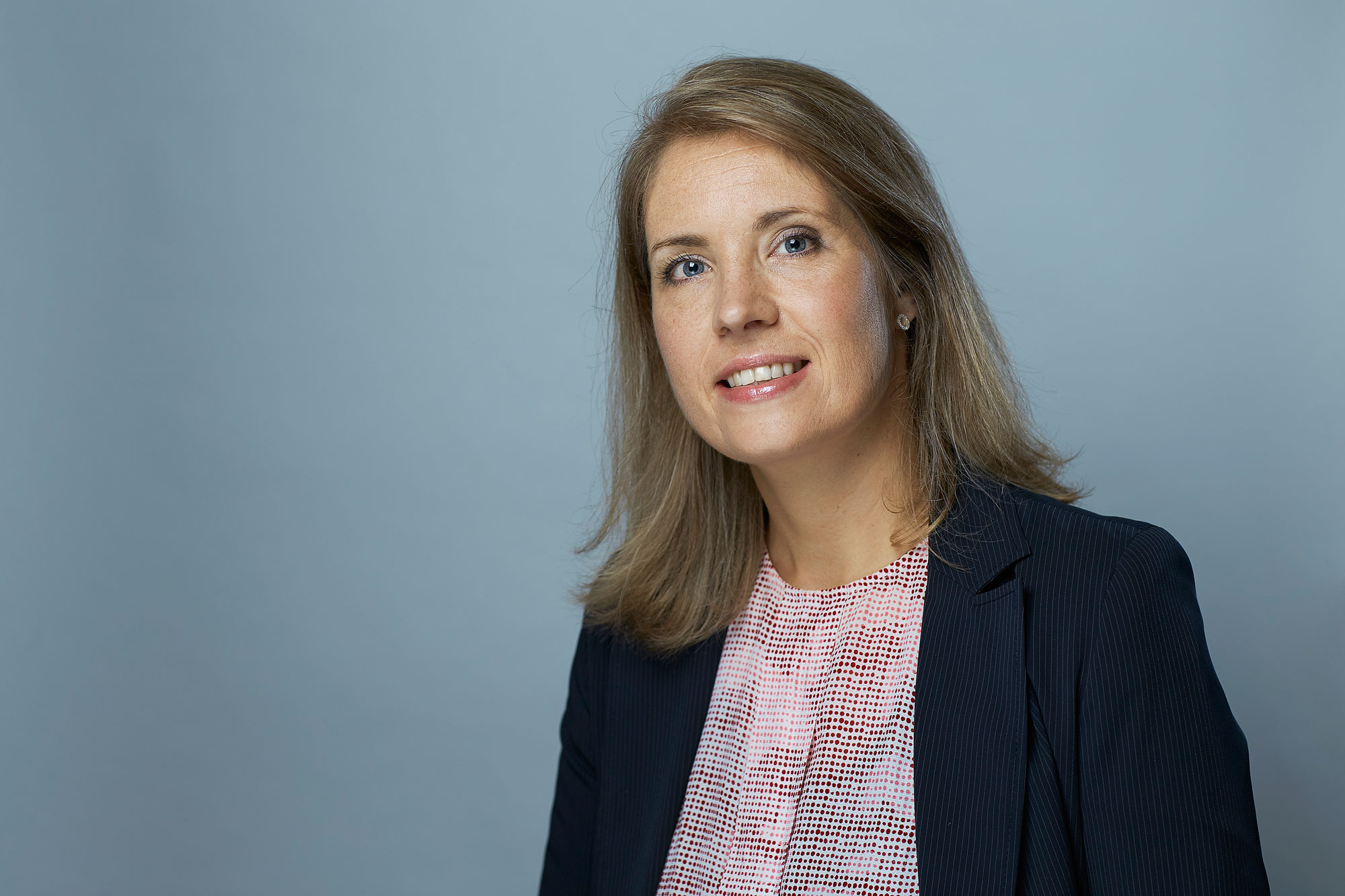 A woman in a suit
