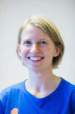 En person som smiler for kameraet