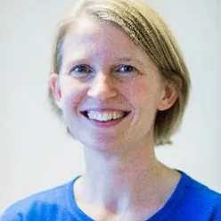 En person som smiler for kameraet