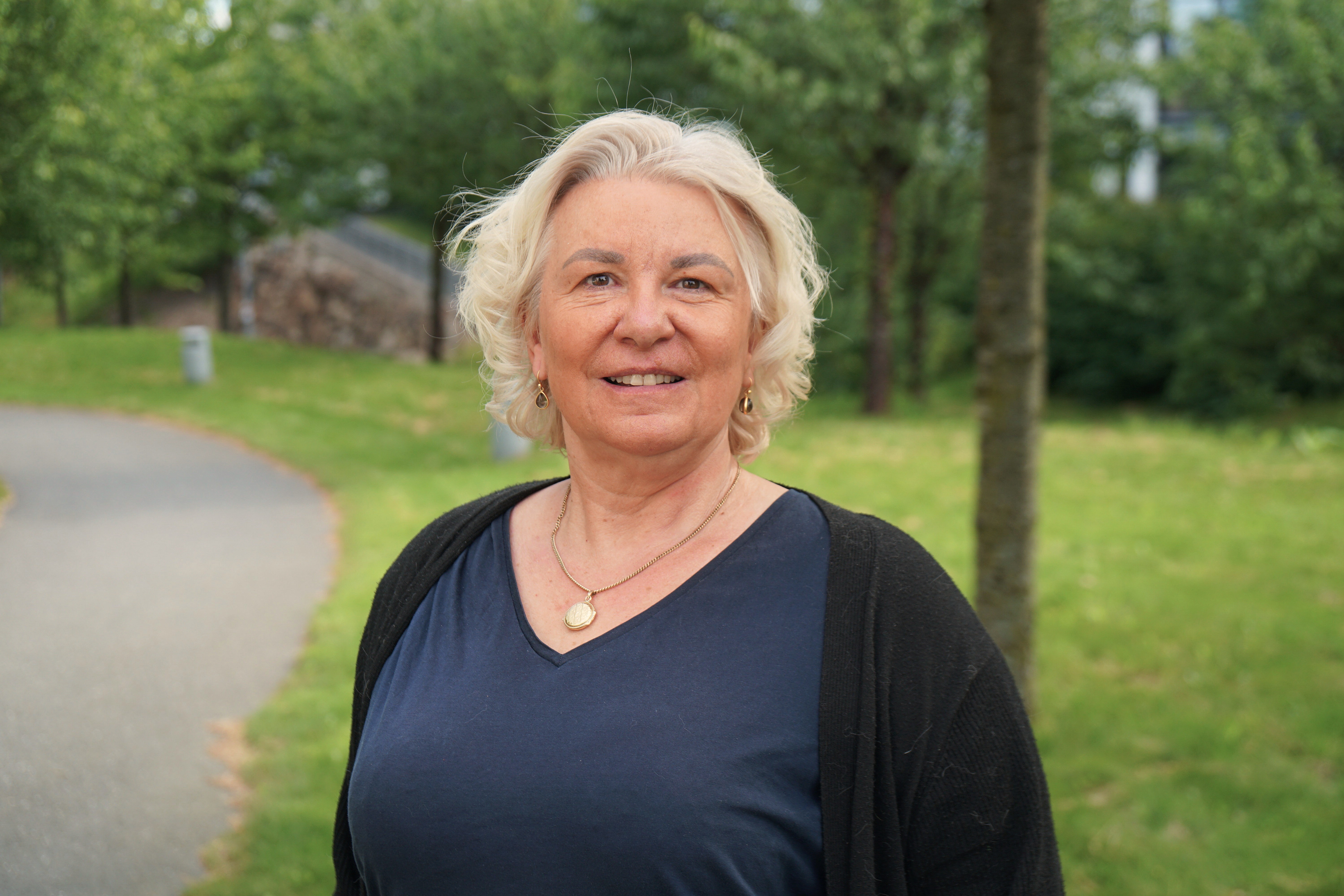 A woman smiling for the camera