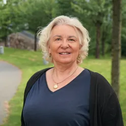 A woman smiling for the camera