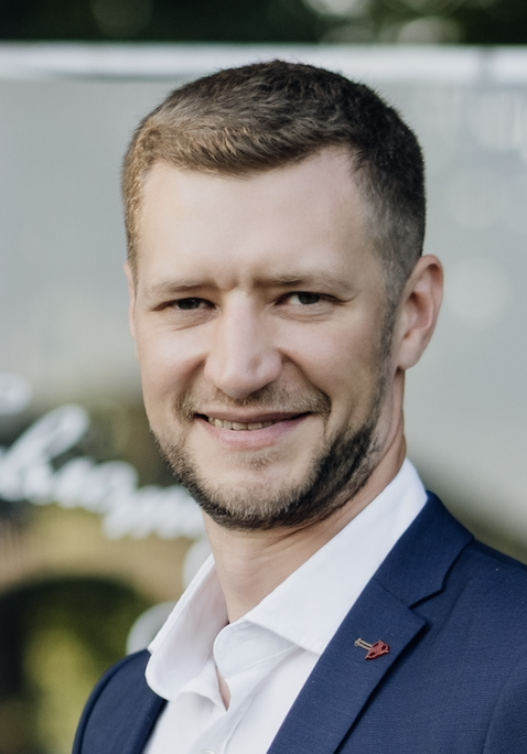 A man smiling for the camera