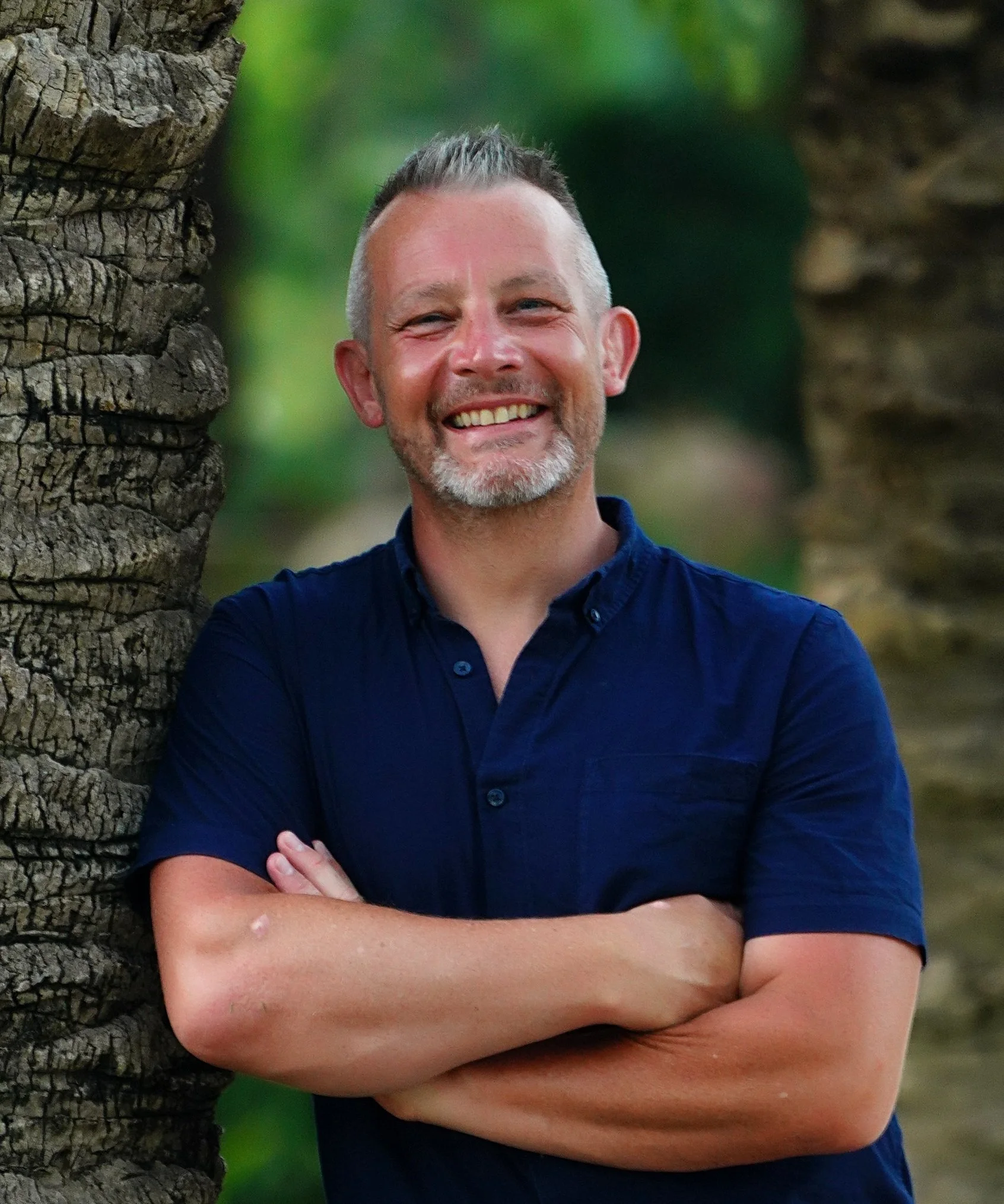 A man with his arms crossed