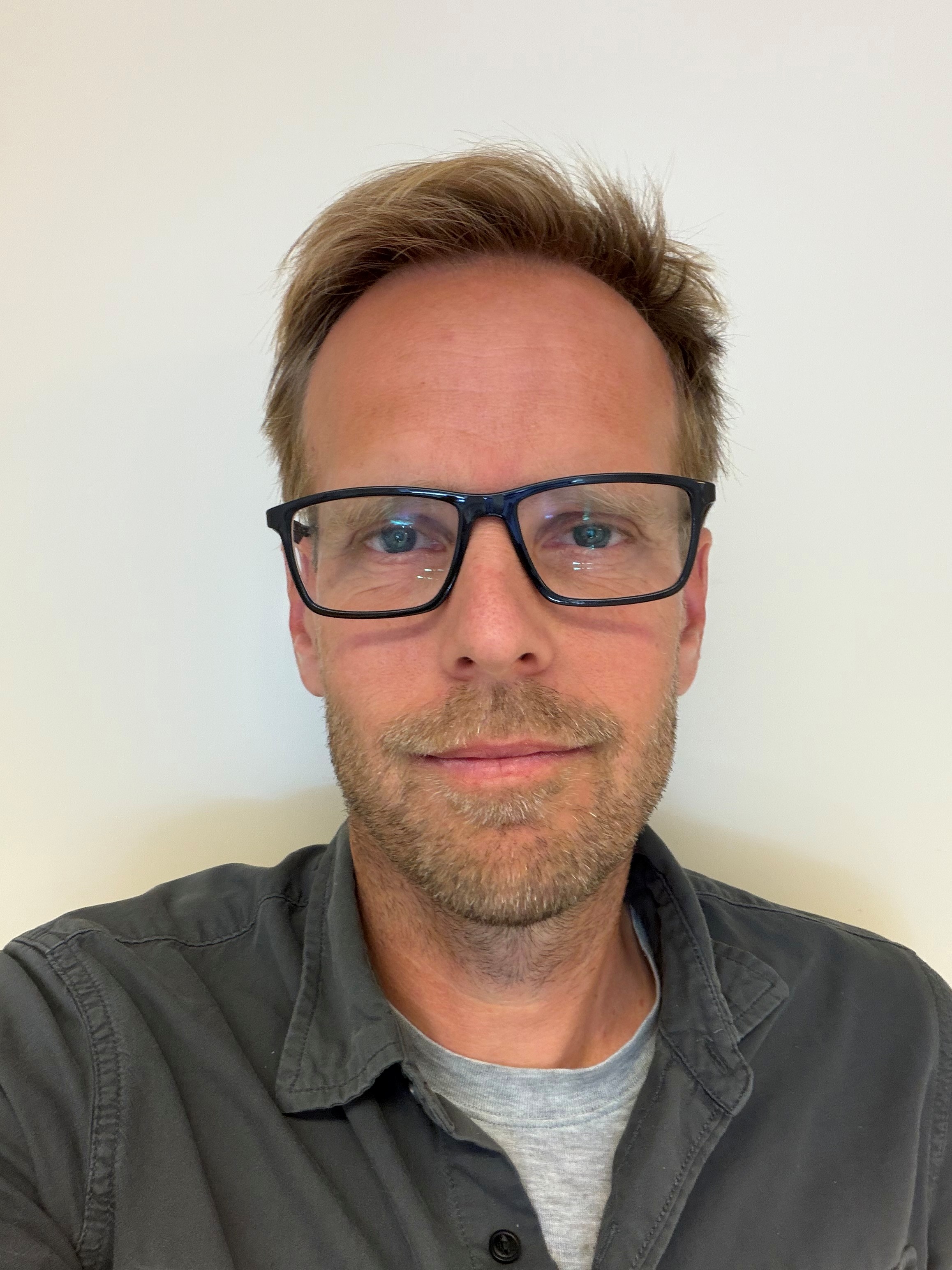 A man wearing glasses