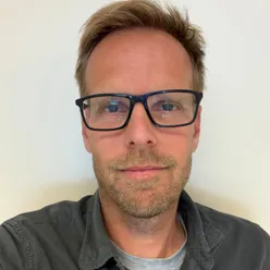 A man wearing glasses
