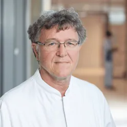 A man wearing glasses