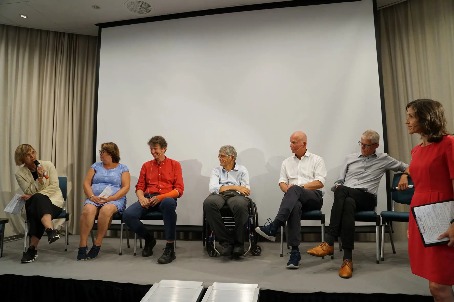 Paneldeltakere på scenen