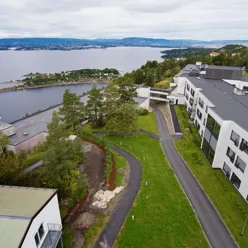 Sunnaas Rehabilitation Hospital seen from above. The Oslofjord in the background.