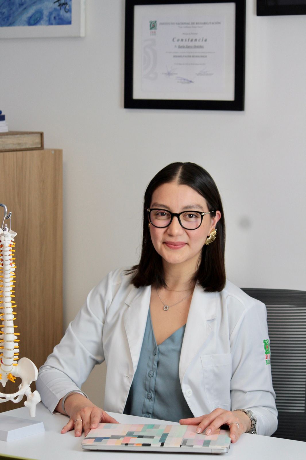 A woman sitting at a desk